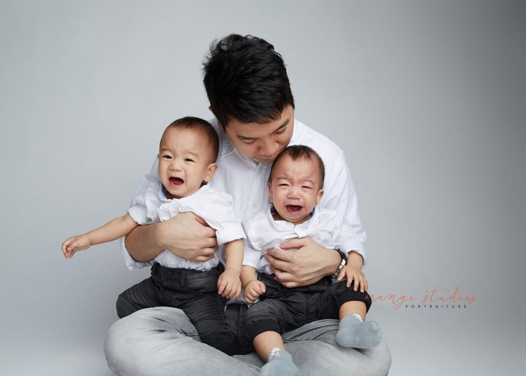 dad and twins family portraits in singapore studio