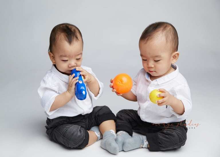 1 year old twin boys siblings portraits in singapore studio