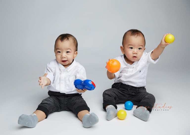 1 year old twin boys siblings portraits in singapore studio