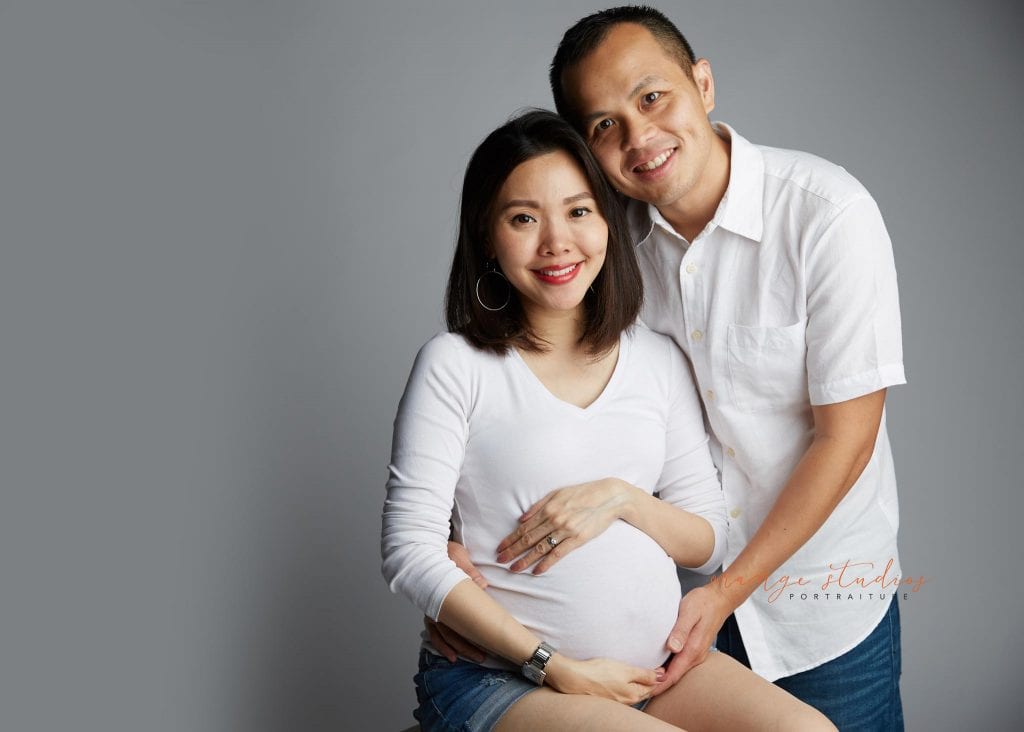 maternity portraits with husband in singapore studio