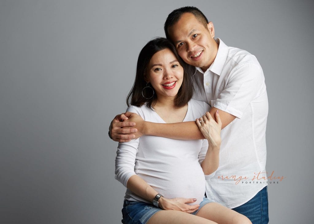 maternity portraits with husband in singapore studio