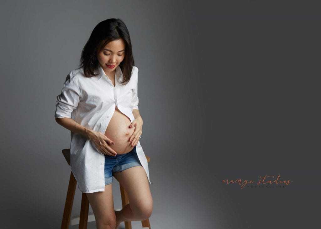 maternity portraits showing baby bump in singapore studio