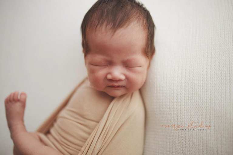 2 weeks old baby girl newborn portraits in singapore studio