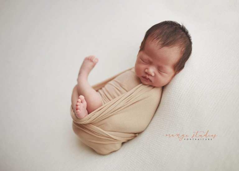 2 weeks old baby girl newborn portraits in singapore studio