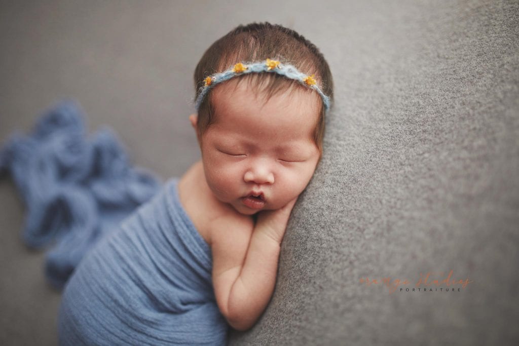 2 weeks old baby girl newborn portraits in singapore studio