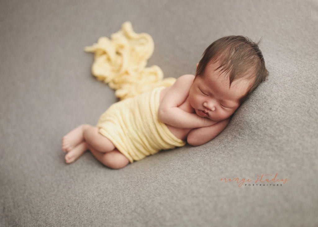 2 weeks old baby girl newborn portraits in singapore studio
