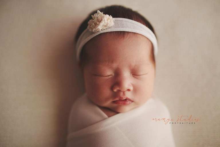 2 weeks old baby girl newborn portraits in singapore studio