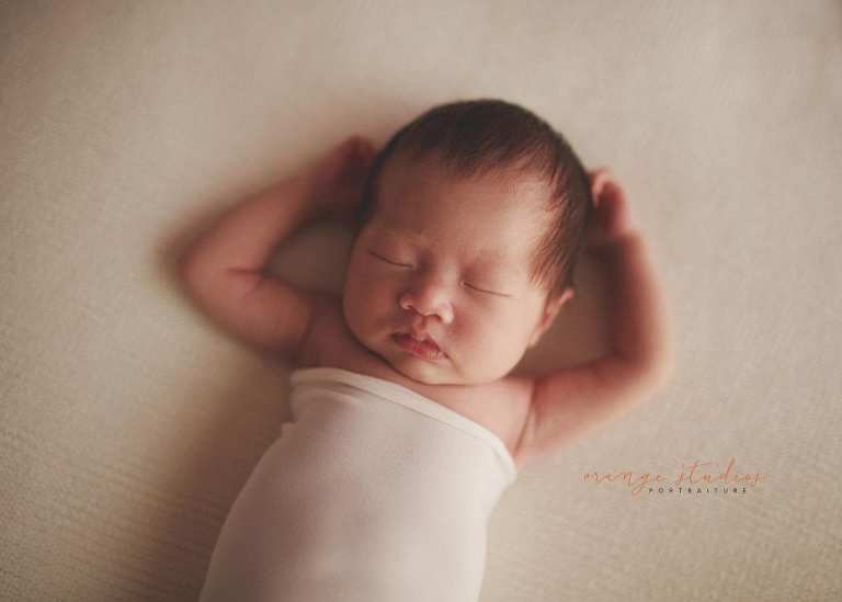 2 weeks old baby girl newborn portraits in singapore studio