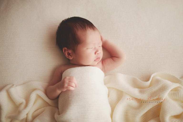 2 weeks old baby girl newborn portraits in singapore studio