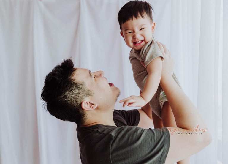 dad and baby boy portraits in singapore studio