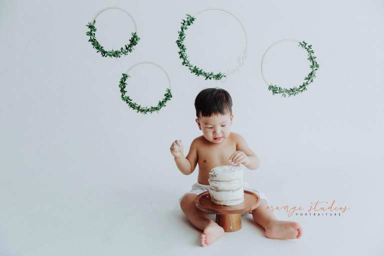 1 year old baby boy cake smash portraits in singapore studio