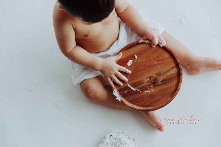 1 year old baby boy cake smash portraits in singapore studio