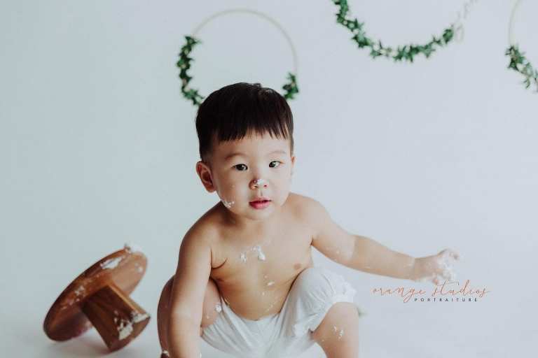 1 year old baby boy cake smash portraits in singapore studio
