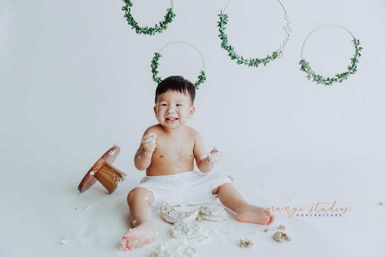 1 year old baby boy cake smash portraits in singapore studio