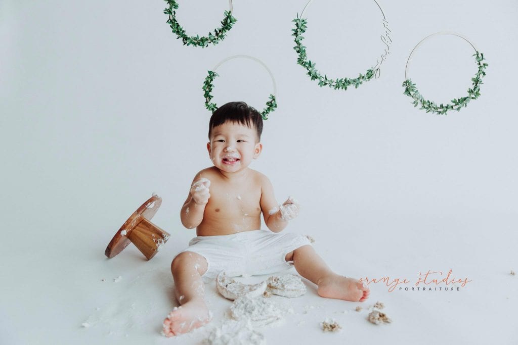 1 year old baby boy cake smash portraits in singapore studio