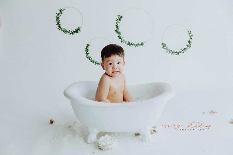 1 year old baby boy bubble bath portraits in singapore studio