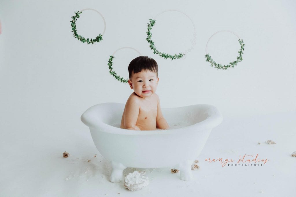 1 year old baby boy bubble bath portraits in singapore studio