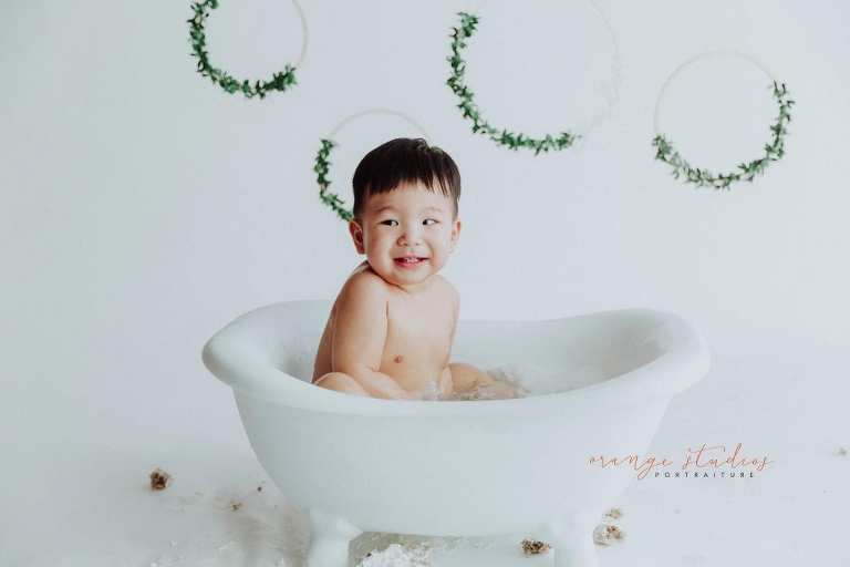 1 year old baby boy bubble bath portraits in singapore studio