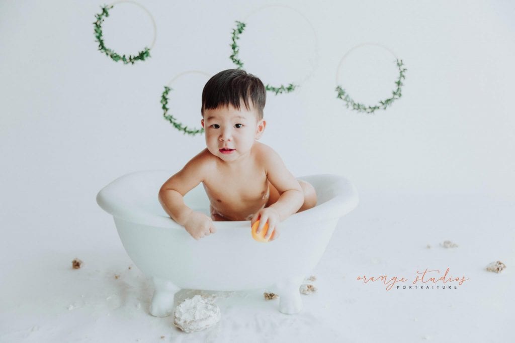 1 year old baby boy bubble bath portraits in singapore studio