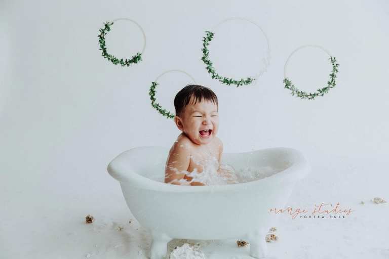 1 year old baby boy bubble bath portraits in singapore studio