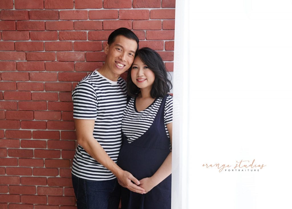 maternity portraits with husband in singapore studio natural light