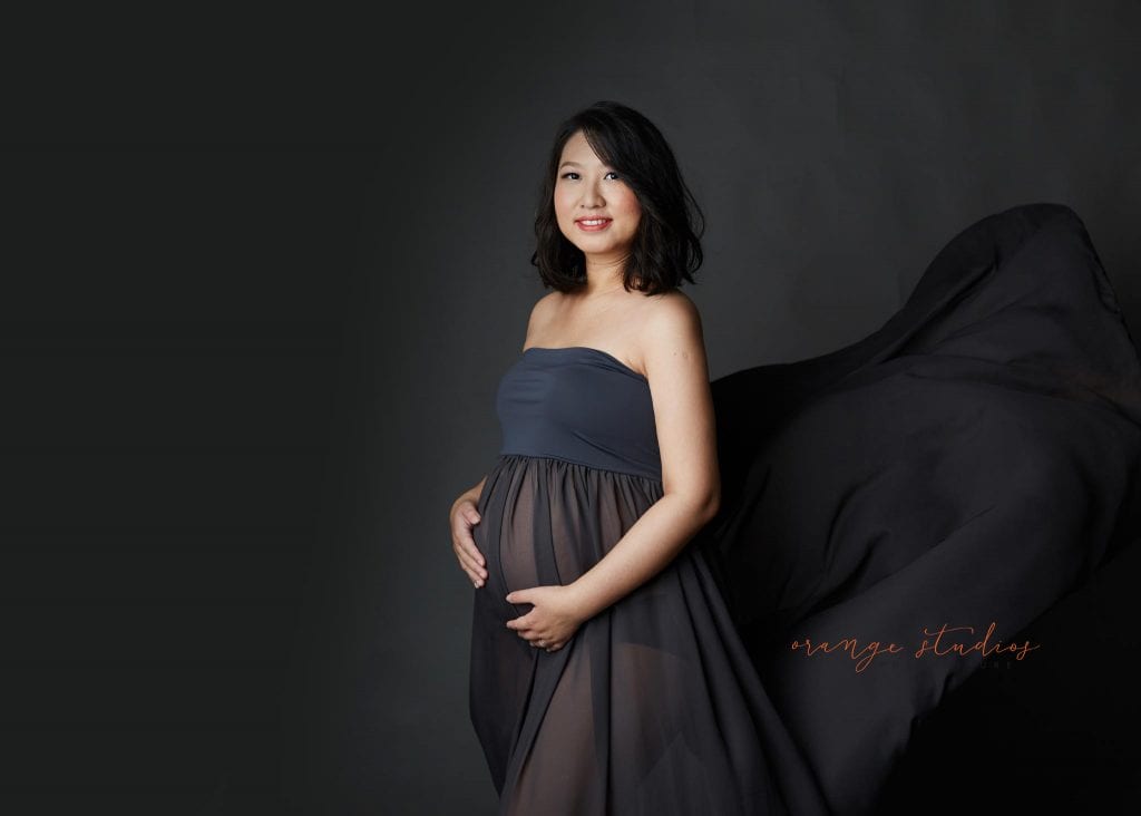 elegant and classy maternity portraits in singapore studio