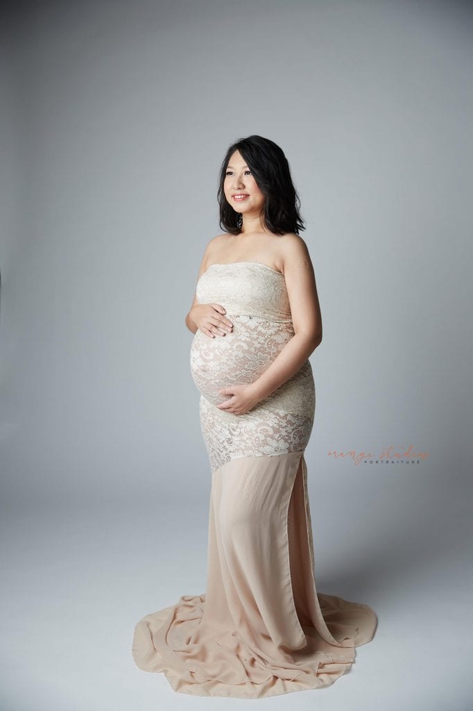 elegant and classy maternity portraits in singapore studio