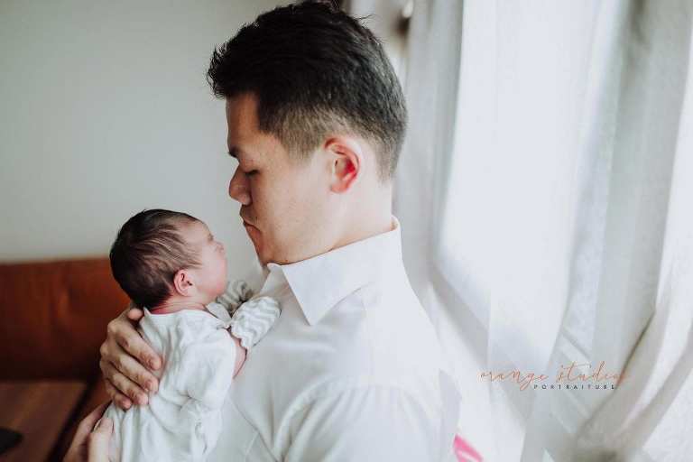 dad and newborn baby fresh 48 photoshoot at home