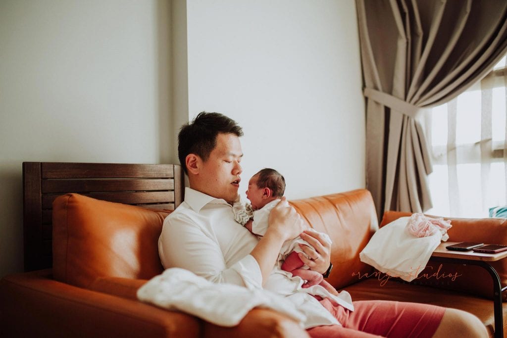 dad and newborn baby fresh 48 photoshoot at home