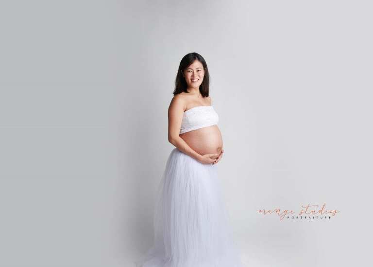 maternity portraits in tulle skirt in singapore studio