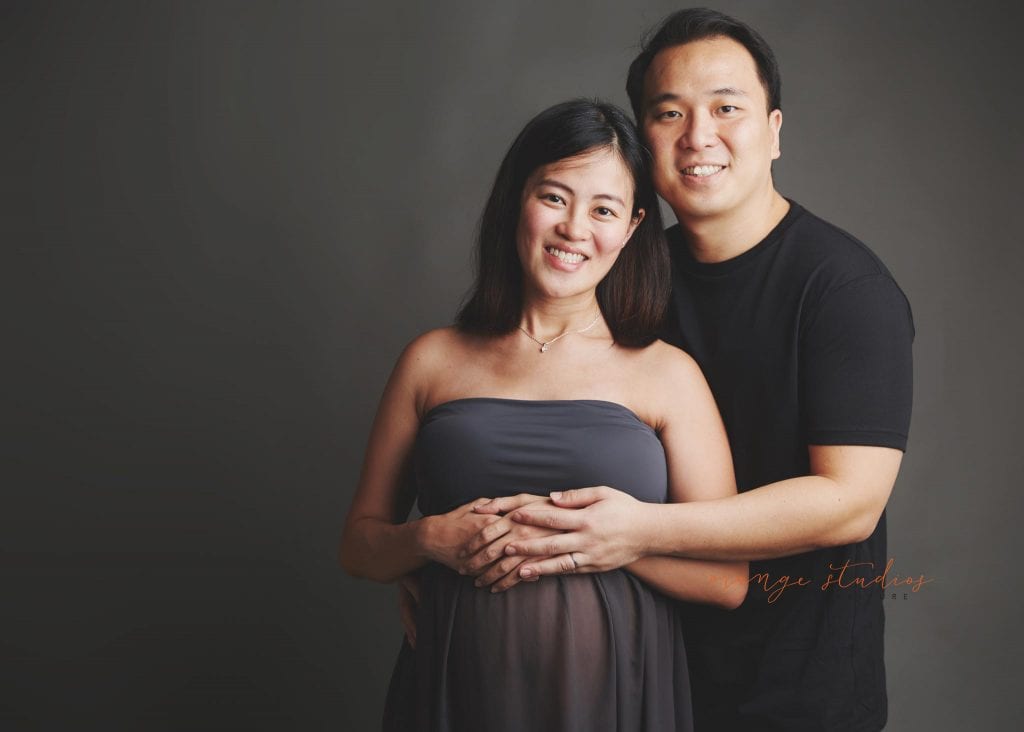 maternity portraits with husband in singapore studio