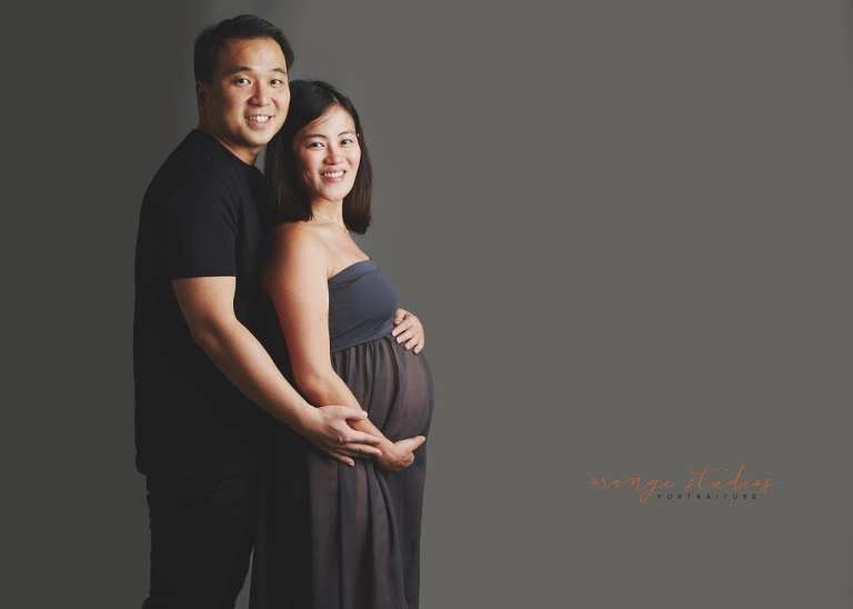 maternity portraits with husband in singapore studio