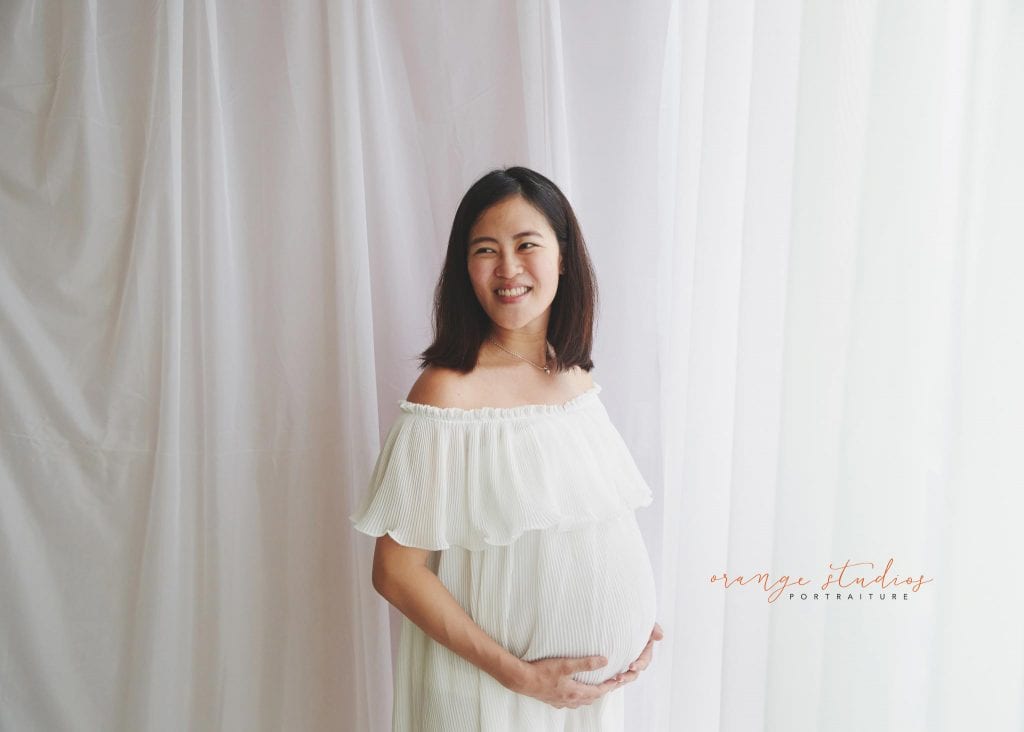 maternity portraits in singapore studio with natural light