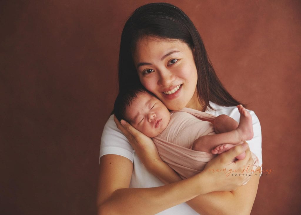 11 days old newborn baby girl portraits with mum in singapore home natural lighting