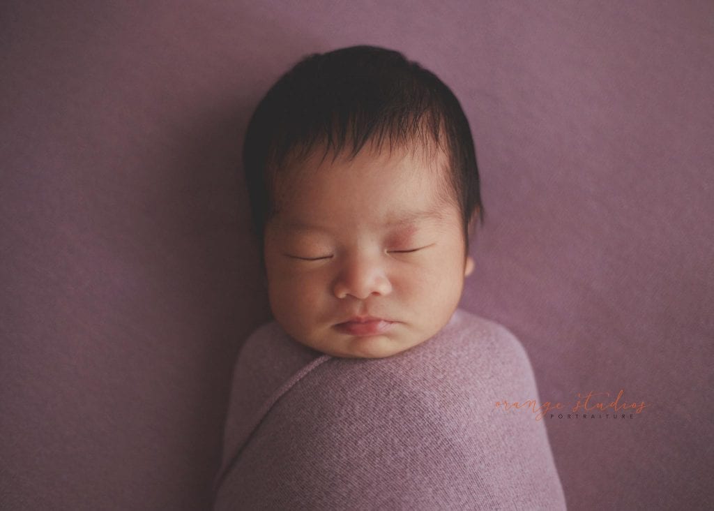 11 days old newborn baby girl portraits in singapore home natural lighting