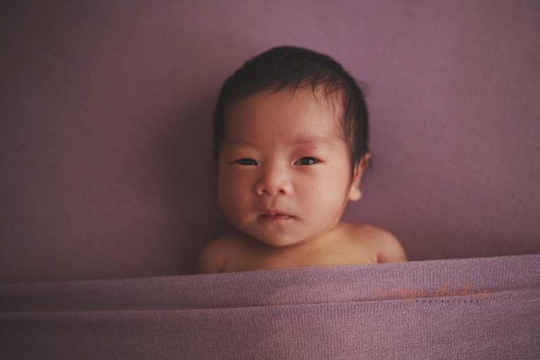 awake 11 days old newborn baby girl portraits in singapore studio natural lighting