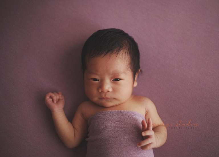 awake 11 days old newborn baby girl portraits in singapore home natural lighting