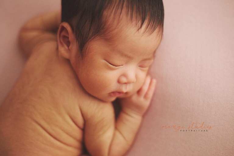 11 days old newborn baby girl portraits in singapore home natural lighting
