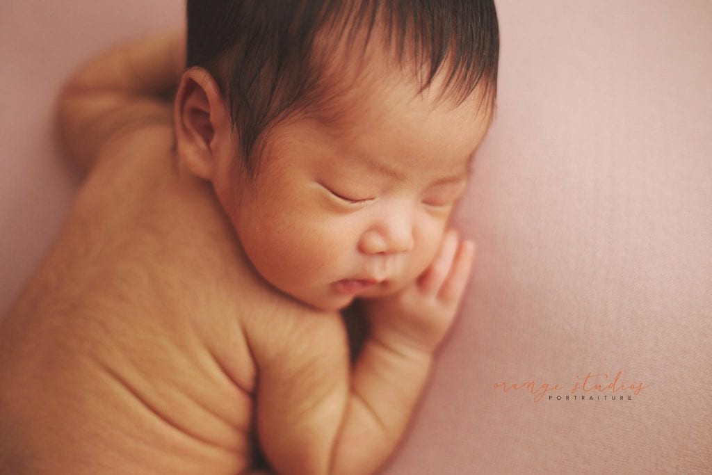 11 days old newborn baby girl portraits in singapore home natural lighting
