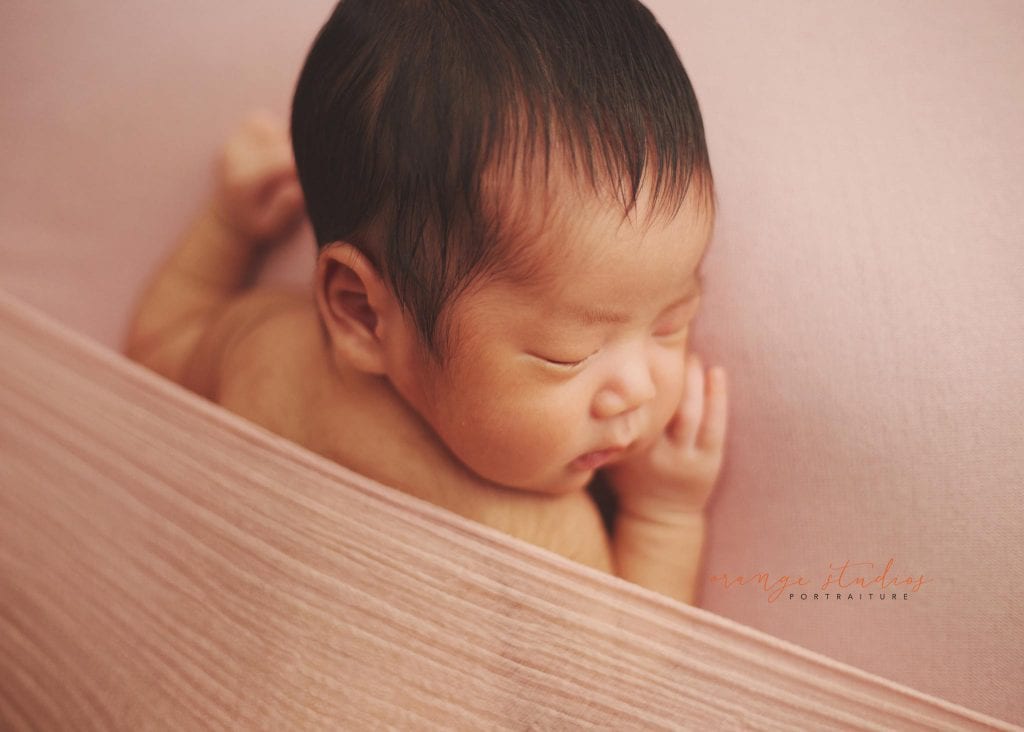 11 days old newborn baby girl portraits in singapore home natural lighting