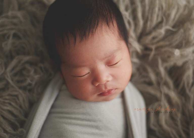 11 days old newborn baby girl portraits in singapore home natural lighting