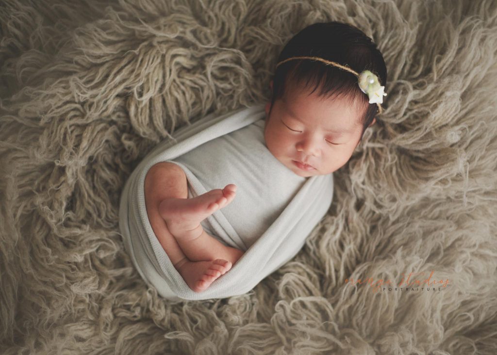 11 days old newborn baby girl portraits in singapore home natural lighting