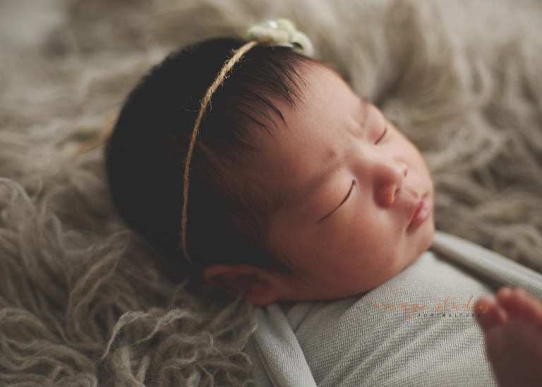 11 days old newborn baby girl portraits in singapore home natural lighting