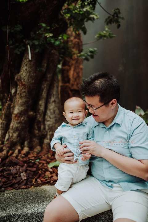 1 year old baby boy with dad in outdoor family portraits