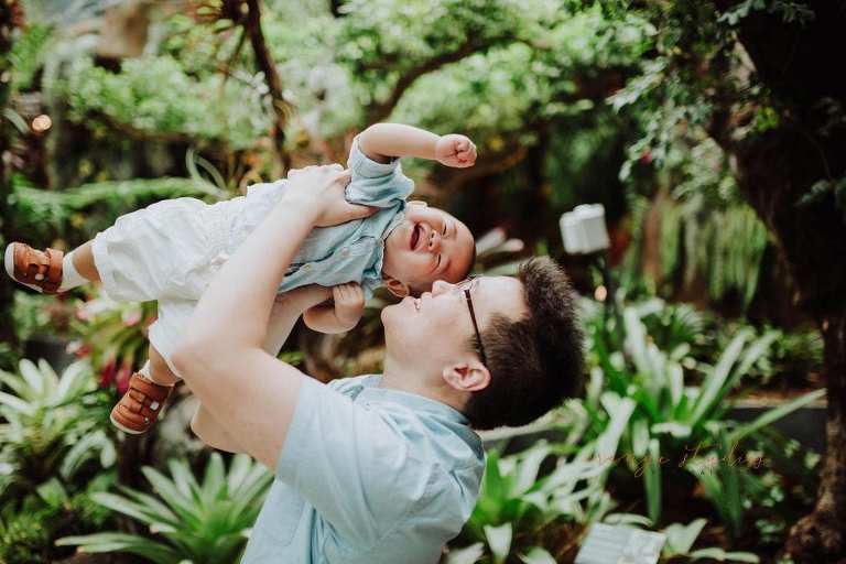 1 year old baby boy with dad in outdoor family portraits