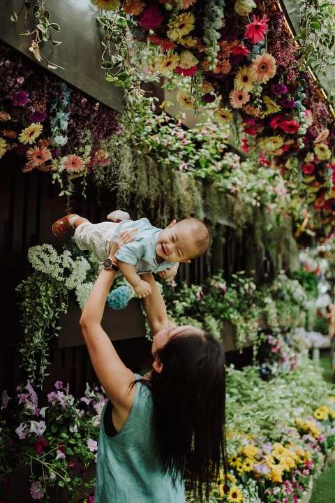 1 year old baby boy with mum in outdoor family portraits