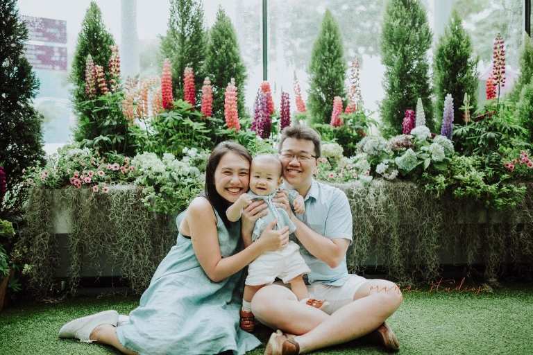1 year old baby boy with parents in outdoor family portraits