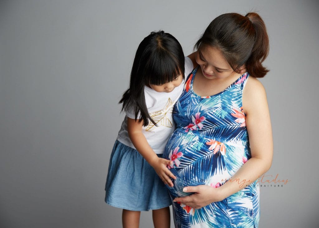 mum and girl maternity portraits in singapore studio