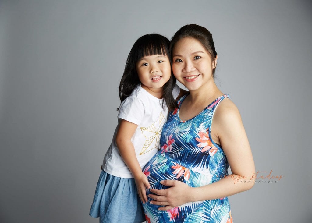 mum and girl maternity portraits in singapore studio