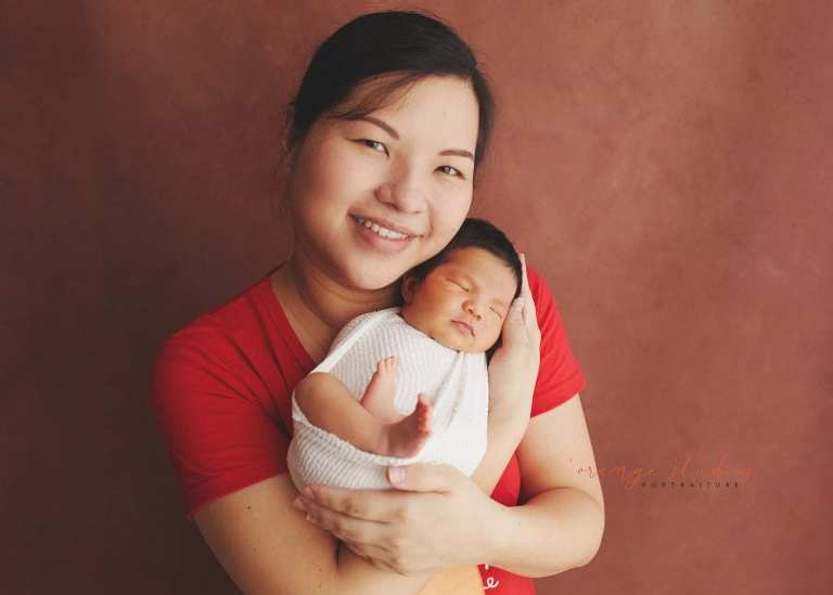 8 days old baby boy with mum newborn portraits in singapore studio